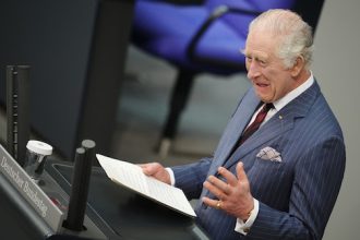 King Charles reads his address at the Bundestag, the German parliament during his 3 day official visit