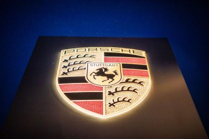 The Porsche carmaker's logo is pictured at the Porsche Center in Stuttgart. Photo: Christoph Schmidt/dpa