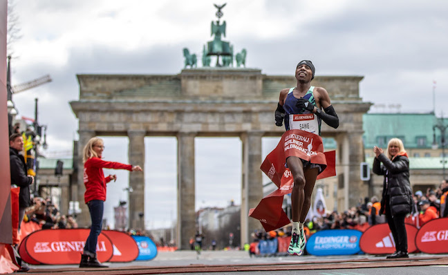 Kenya's Sabastian Sawe crosses the finish line as the winner of the Berlin Half Marathon 2023. Photo: Andreas Gora/dpa
