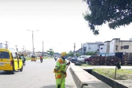 LAWMA worker keeping the streets clean ahead of the Easter Celebration