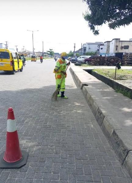 LAWMA worker keeping the streets clean ahead of the Easter Celebration