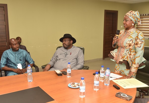 The Chairman of the NDDC Governing Board, Mrs. Lauretta Onochie, (right) speaking when she hosted members of the Niger Delta Youth Assembly at the NDDC headquarters. In the middle is the Representative of the North West on the NDDC Board, Prince Sule Iko Sami, while the President of the Niger Delta Youth Assembly, Comrade George Godwin is on the left