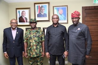 L-R: The NDDC Executive Director Finance and Administration, Maj-Gen. Charles Airhiavbere (Rtd); the Commanding Officer 29 Battalion, Nigerian Army, Port Harcourt, Lt. Colonel Aliyu Manga; the NDDC Managing Director, Dr. Samuel Ogbuku and the Executive Director, Projects, Mr. Charles Ogunmola, during a courtesy visit at the NDDC headquarters in Port Harcourt.