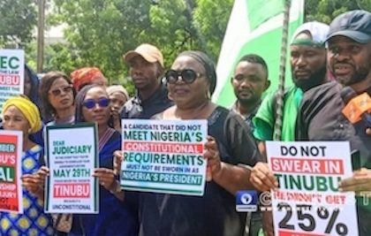 Nigerians protesting outside the Presidential Election Tribunal sitting at the Appeal Court in the FCT