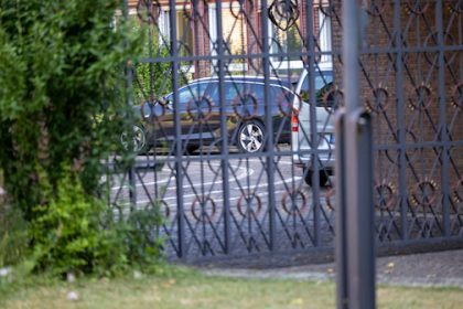 Cars are parked at the residence of Cologne Archbishop Rainer Maria Woelki. The public prosecutor's office and police in Cologne search several properties in the archdiocese of Cologne. Photo: Thomas Banneyer/dpa