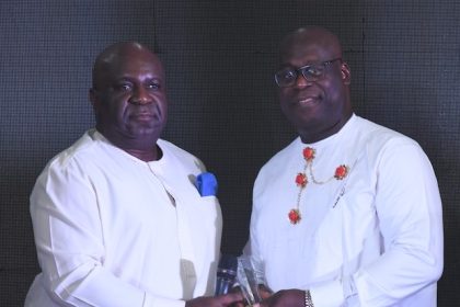 The NDDC Director, Health and Social Services, Dr. George Uzonwanne, (right) representing the NDDC Managing Director, Dr. Samuel Ogbuku, receiving the “Heart of Gold Award” from Chairman/CEO of DKL Development Ltd, Mr. Kio Lawson, (left) during the 13th Edition of the Eveafrique Redball event in Port Harcourt.