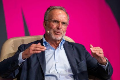 Karl-Heinz Rummenigge, member of UEFA's Executive Committee, speaks during a panel discussion at the SpoBis Congress. Photo: David Inderlied/dpa