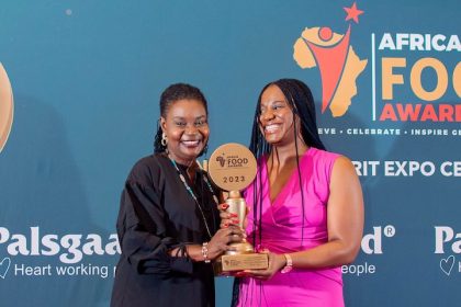L-R: Damilola Adeniyi, Corporate Affairs Manager, and Elizabeth Nnoko, Communications Manager, both of Olam Agri in Nigeria, holding the Sustainability Initiative of the Year Award received by Olam Agri for its Seeds for the Future (SFTF) initiative, at the African Food Awards 2023, held on Friday, June 16, 2023, in Nairobi, Kenya.