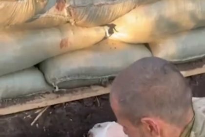 Head of Ukrainian Platoon wounded in the battle field on Orekhov receiving medical care from Russian soldiers