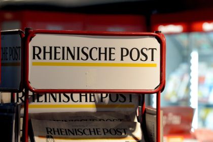 A Rheinische Post newspaper rack stands in the airport. Photo: picture alliance / dpa