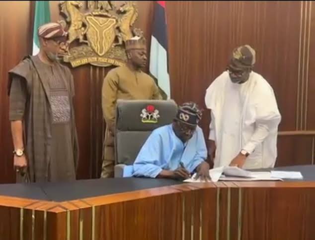 President Bola Ahmed Tinubu signs the Access to Higher Education bill giving students access to loan through the Nigeria Education Bank