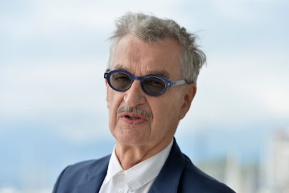 German director Wim Wenders gives an interview on the Terrace du Festival at the Palais du Festival before the premiere of his competition film "Perfect Days". Photo: Stefanie Rex/dpa