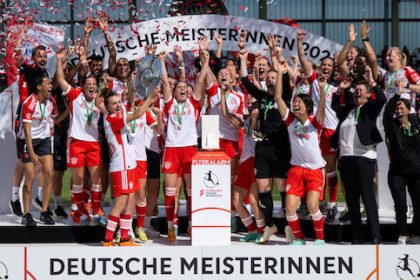 Bayern Munich players cheer with the championship trophy after the German Bundesliga Women soccer match between Bayern Munich and Turbine Potsdam at Turbine Potsdam. Photo: Sven Hoppe/dpa