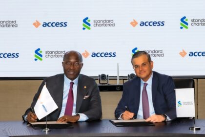 L-R: Roosevelt Ogbonna, Group Managing Director, Access Bank Plc, and Sunil Kaushal, Regional CEO, Africa & Middle East, Standard Chartered at the signing of agreements for Access Bank’s acquisition of Standard Chartered’s shareholding in its subsidiaries in Angola, Cameroon, The Gambia, and Sierra Leone, and its Tanzanian Consumer, Private & Business Banking business in London on Friday.