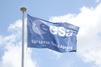 A flag with the logo of the European Space Agency (ESA) flutters in the wind on the premises of the Kourou space station in French Guiana. ESA performs unique burn-up of satellite in Earth's atmosphere. Photo: Janne Kieselbach/dpa