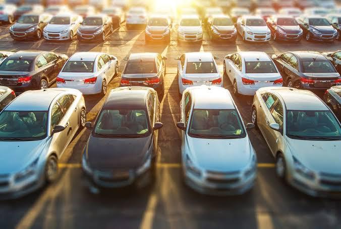 Vehicles parked neatly in the park of a car dealer