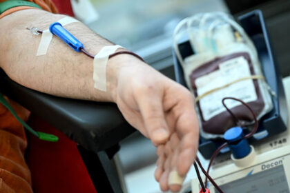 A patient donating blood in the hospital