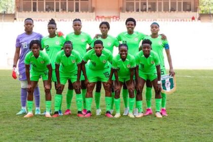 Peace Efih (second from left, front row) lines up with the Super Falcons before the clash with Cape Verde on Thursday.