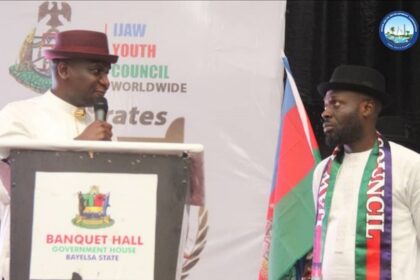The NDDC Managing Director, Dr Samuel Ogbuku (left), speaking at the Dinner and Awards Night to mark the 25th Silver Jubilee of the Kaiama Declaration and foundation of the Ijaw Youth Council, IYC, in Yenagoa, Bayelsa State. On the right is the IYC President, Mr. Jonathan Lokpobiri.