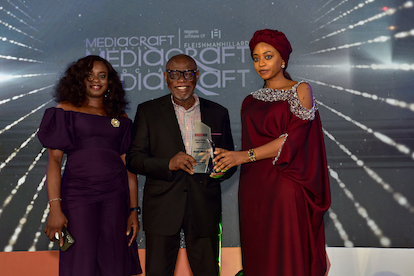 L-R, Ima Brown, Senior Manager, Human Resources, Mediacraft Associates; John Ehiguese, Group Chief Executive Officer, Mediacraft Associates, receiving the PR/Media Agency of the Year Award from Adaora Chukwu, Commissioner for Trade, Investment and Industry, Enugu State, at the Nigerian Business Leadership Awards (NBLA) on Saturday, December 9, 2023, at the Landmark Event Centre in Lagos.