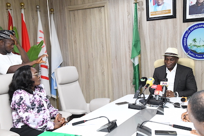 The NDDC Managing Director, Dr. Samuel Ogbuku(right) speaking during the press interview at the commission's headquarters in Port Harcourt. On the left is the Director Corporate Affairs, Mrs. Seledi Thompson-Wakama