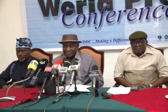 The NDDC Managing Director, Dr Samuel Ogbuku, (middle) flanked by the NDDC Executive Director Corporate Services, Hon. Ifedayo Abegunde (left) and the Executive Director, Projects, Sir Victor Antai (right), during a World Press Conference in Port Harcourt.