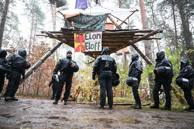 Tesla protest in woods