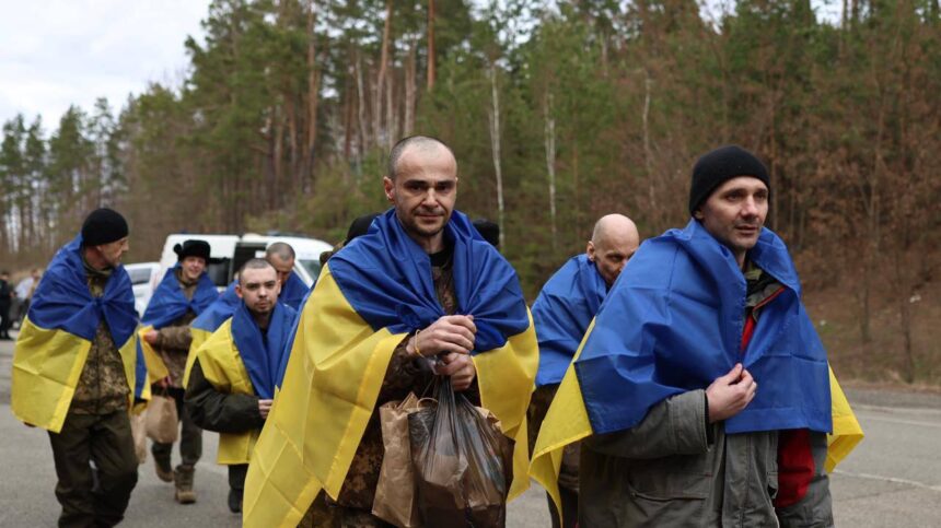 Captured Ukrainian soldiers return home following exchange deal with Russia