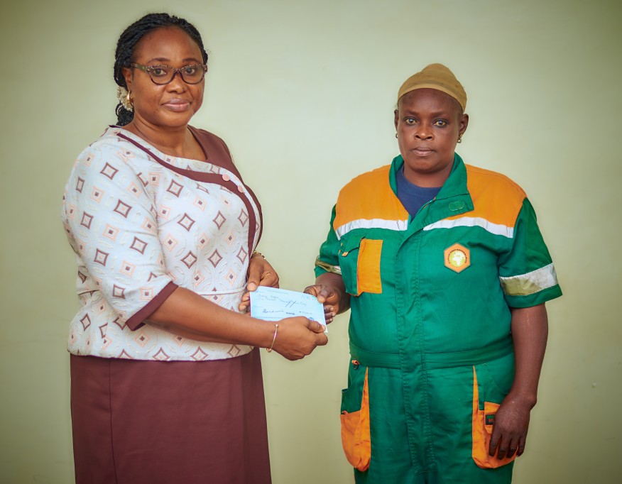 LAWMA presents cheques to injured sweepers